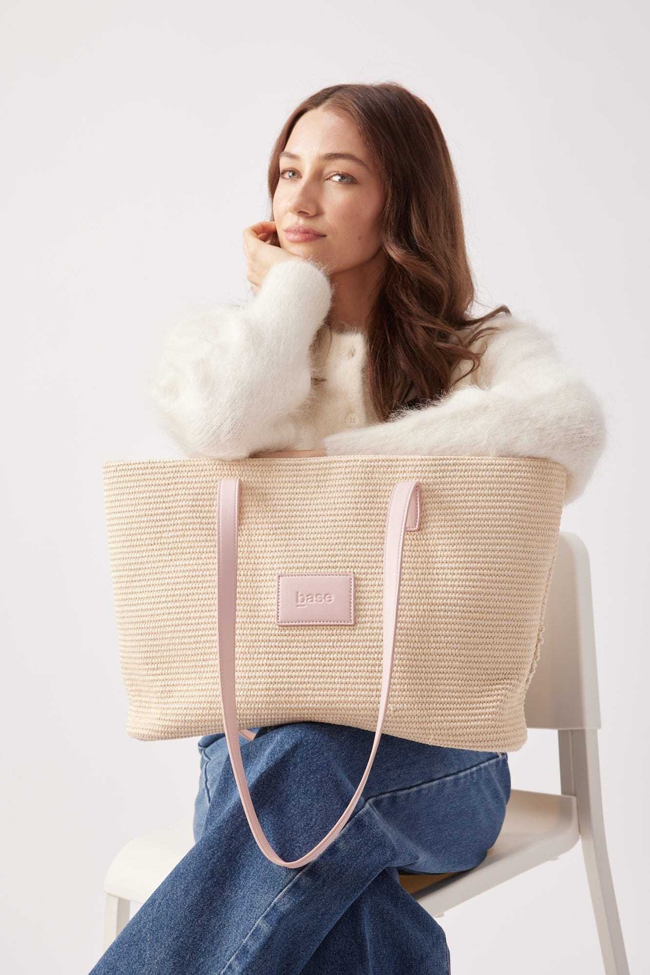 Base Supply Panier woven straw tote bag with pink straps and cotton lining