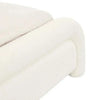 Close-up of Ivory Boucle upholstered Almos Chubby Bed corner with thick tubular curved design and soft texture.