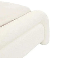 Close-up of Ivory Boucle upholstered Almos Chubby Bed corner with thick tubular curved design and soft texture.