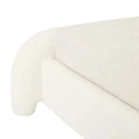 GlobeWest Almos Chubby Bed in king size with ivory boucle upholstery and sculptural curved design