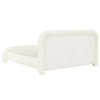 Ivory boucle upholstered GlobeWest Almos Chubby King bed with sculptural curved design and fully upholstered frame