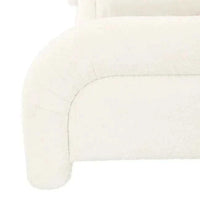Close-up of GlobeWest Almos Chubby King bed in ivory boucle fabric showing plush, tubular upholstered curves and modern design.