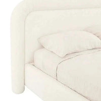 Ivory boucle upholstered GlobeWest Almos Chubby Bed king size with rounded sculptural curves and plush headboard