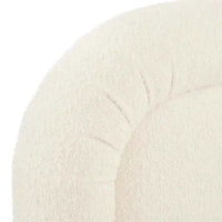 Ivory boucle fabric close-up of GlobeWest Almos Chubby Bed with thick tubular curves and soft texture