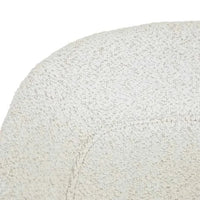 Close-up of GlobeWest Turner Barstool seat in birch boucle upholstery with bone powdercoated metal frame