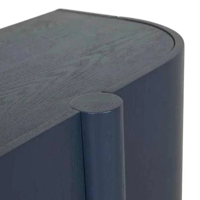 Close-up of GlobeWest Artie Buffet in Twilight color showing curved ash veneer surface and rounded corner design.