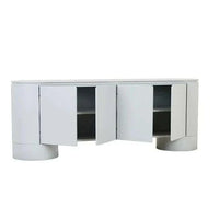 GlobeWest Pluto Buffet in powder blue with rounded silhouette and circular legs, featuring four doors and internal shelving for modern storage.