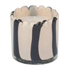 Ella Glass Candle in ivory and black with scalloped rim and striped pattern in a hand-painted glass vessel.