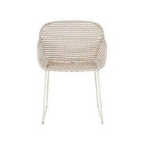GlobeWest Cabana Link dining armchair in sand linen with metal frame and woven resin seat