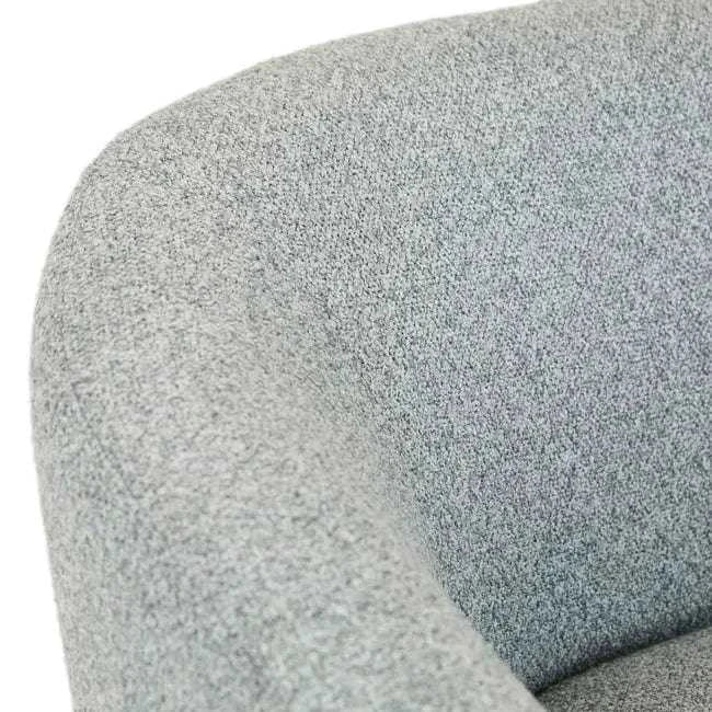 Close-up of GlobeWest Flo Occasional Chair upholstery in Nimbus fabric with natural ash wood leg