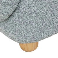 Close-up of GlobeWest Flo Occasional Chair showing Nimbus textured upholstery and natural ash wooden leg