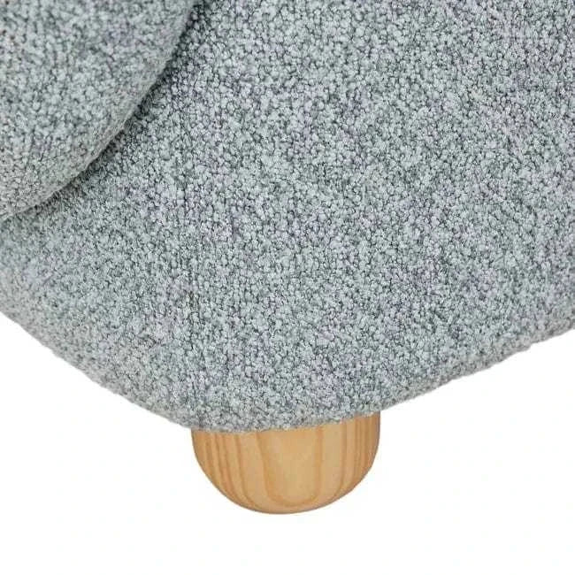 Close-up of GlobeWest Flo Occasional Chair showing Nimbus textured upholstery and natural ash wooden leg