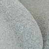 Close-up of Nimbus grey polyester upholstery fabric on GlobeWest Flo Occasional Chair with soft textured finish