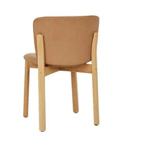 GlobeWest Sketch Pinta Dining Chair in pecan leather with light oak solid oak frame and curved backrest.