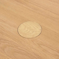 Natadora Pivot coffee table in light oak with solid timber asymmetrical base and modern design