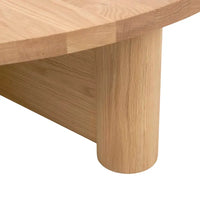 Natadora Pivot coffee table in light oak with modern asymmetrical solid timber base