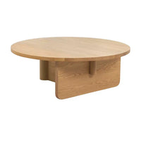 Natadora Pivot coffee table in light oak with asymmetrical solid timber base and PU finish