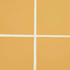 Close-up of honey-colored GlobeWest Seville Tile with white grout lines in a minimalist grid pattern
