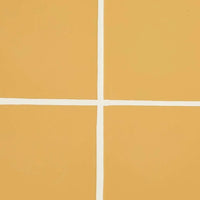 Close-up of honey-colored GlobeWest Seville Tile with white grout lines in a minimalist grid pattern