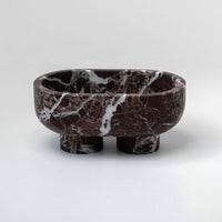 CoTheory Marble Footed oval tray in Rosso Levanto marble with sculptural design and polished finish