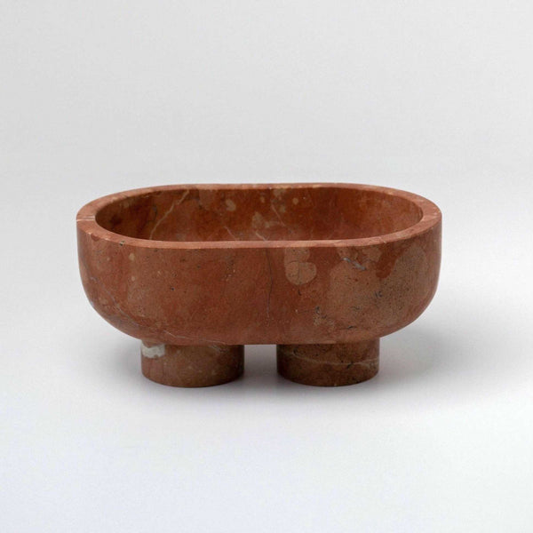 CoTheory Marble Footed Oval Tray in Rosso Alicante with sculptural stone design and unique organic patterns