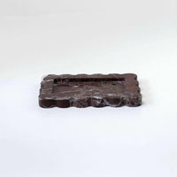 CoTheory small scalloped Rosso Levanto marble tray with intricate design and felt pads
