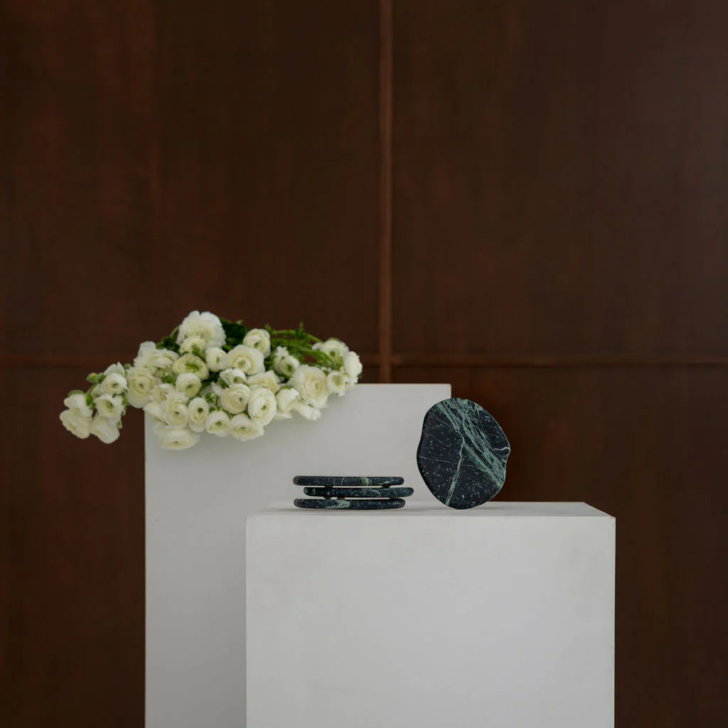 CoTheory Anchor Stone Coasters in Verde Alpi protecting surfaces with a set of four sturdy, calming stone coasters