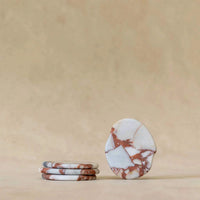 CoTheory Anchor Stone Coasters brown Calacatta granite set of four protecting surfaces with elegant design