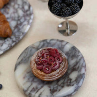 CoTheory Viola Calacatta small Solstice sculpted tray with graceful curves and natural stone pattern