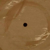 Close-up of white speckle tile ceramic glaze on GlobeWest Hanson Alo Planter with drainage hole detail