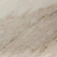 GlobeWest Rufus Indra Bowl in polished oat marble with handcrafted natural veining and elevated rounded design.