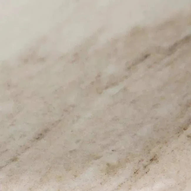 GlobeWest Rufus Indra Bowl in polished oat marble with handcrafted natural veining and elevated rounded design.