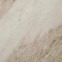 Close-up of polished oat marble surface texture of GlobeWest Rufus Indra Bowl