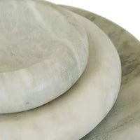 Set of three polished Green Onyx GlobeWest Rufus Indra Bowls in varying sizes, handcrafted marble indoor decorative bowls.