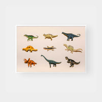Dinosaur figurine print wall art featuring various colorful dinosaur models on a light background in a white frame