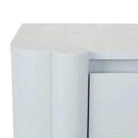 GlobeWest Artie Dresser in powder blue with sculptural pillar legs, rounded fronts, and three drawers