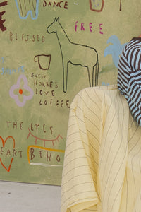 Detail of the Even Horses Love Coffee artwork surface