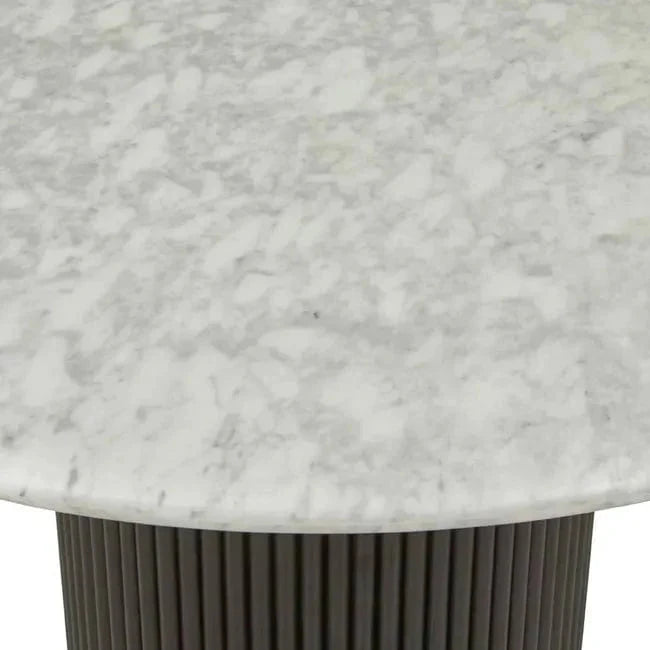 Close-up of Globe West Benjamin Ripple Marble Dining Table featuring white Carrara marble top and black ribbed ripple motif base