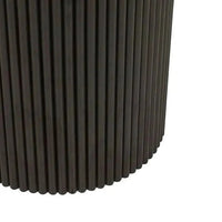 Close-up of the matt black ripple timber base of the Benjamin Ripple Marble Dining Table by Globe West