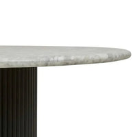 Circular Benjamin Ripple Marble Dining Table with white Carrara marble top and black rippled timber pillar base