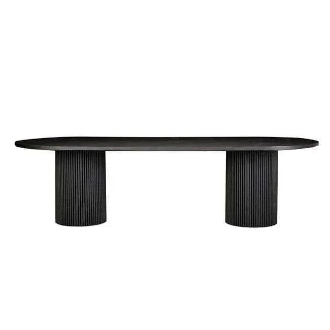 Benjamin Ripple Oval Dining Table in matte black with rippled pillar bases and ash veneer top.