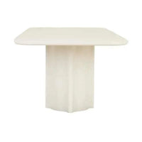 GlobeWest Leon Dining Table in porcelain finish with sculptural form and fluted pillar base