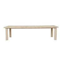 GlobeWest Montana Raft Dining Table in aged teak wood with slatted top and sturdy corner legs for outdoor seating up to eight.