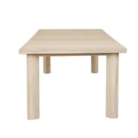 GlobeWest Montana Raft Dining Table in aged teak with slatted top and solid corner legs for outdoor dining