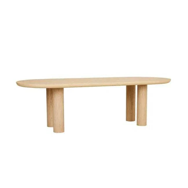 GlobeWest Seb Oval Four Leg Dining Table in oak veneer with natural PVC and oak legs, seating up to 10.