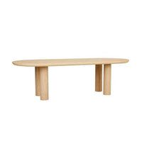 GlobeWest Seb Oval Four Leg Dining Table in oak veneer with natural PVC and oak legs, seating up to 10.