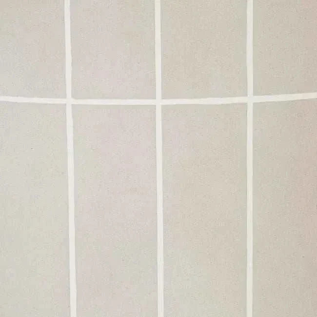 Close-up of pearl white tiled surface with clean grout lines from GlobeWest Seville Tile Oval Dining Table