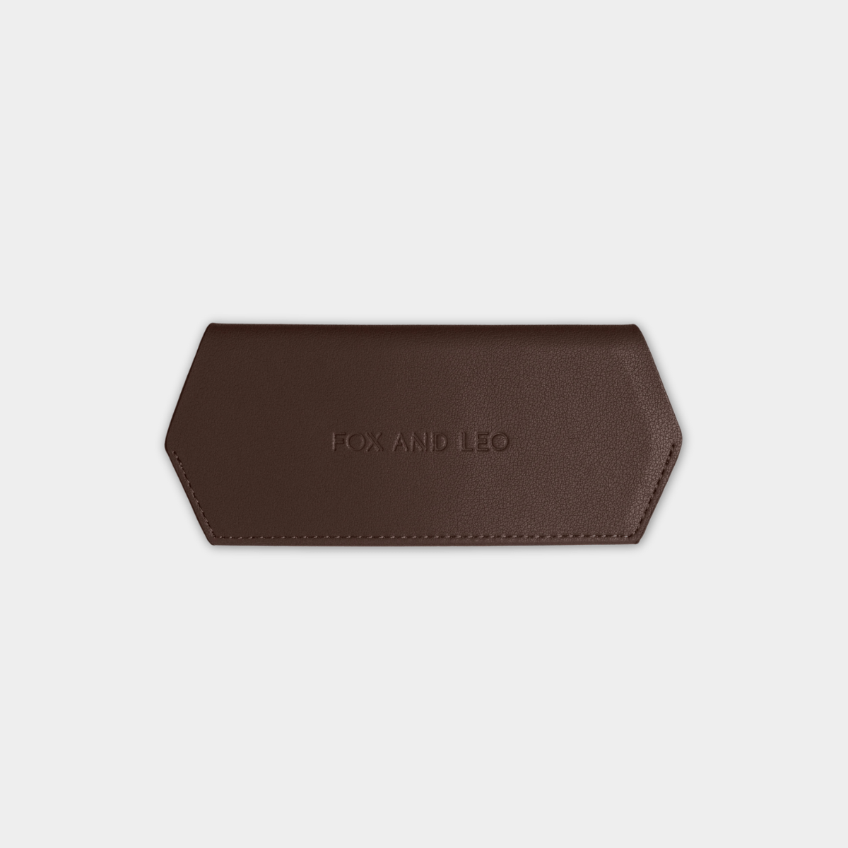 Fox and Leo slim 100% leather chocolate glasses case with magnetic closure and protective microfiber lining.