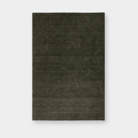 Sandringham Floor Rug in forest green with dense wool pile and subtle fringing, handknotted luxury design.