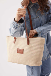 Base Supply Panier tan woven straw tote bag with leather straps and cotton lining